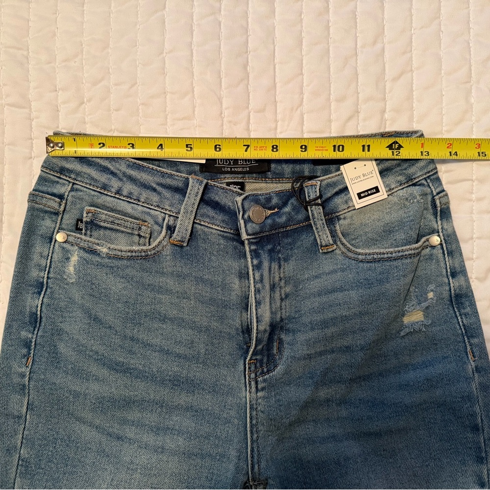 Judy Blue Mid Rise Medium
Wash Distressed Released Hem Bootcut - Picture 7 of 16
